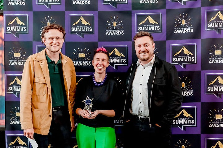 Chris Stone, Suze Cooper and Rob Le Mare collect the award for Best Commercial Strategy at the Publisher Podcast Awards 2025