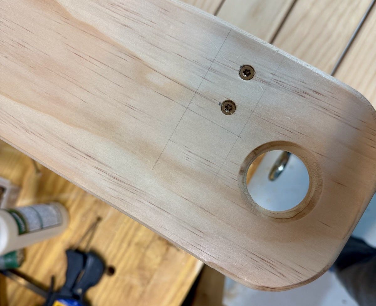 A hole in the arm rest is where a rope or chain will pass through to attach to the eye bolt. A hole in the arm rest is where a rope or chain will pass through to attach to the eye bolt.