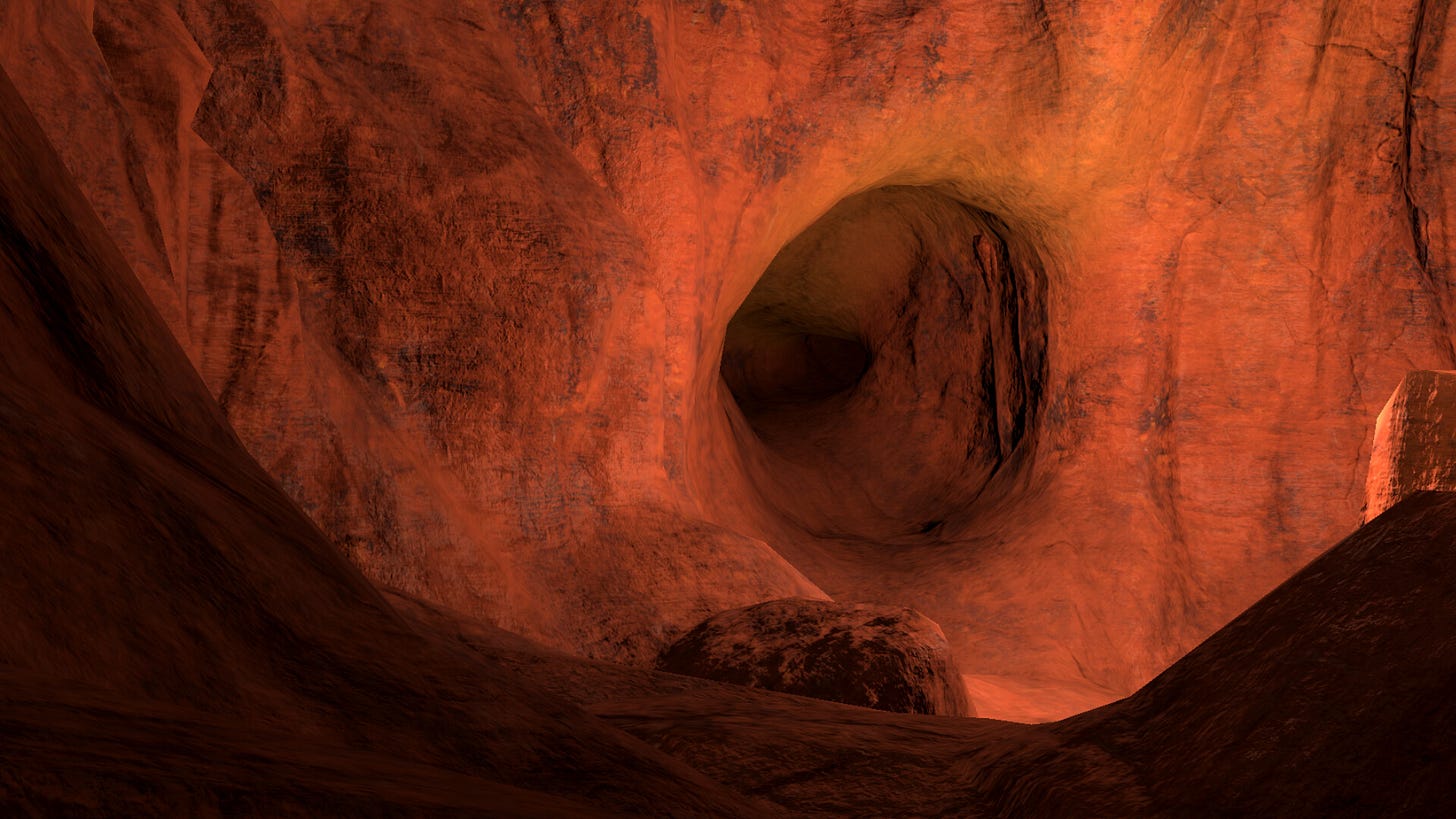 A orange, barely lite wall inside a cave