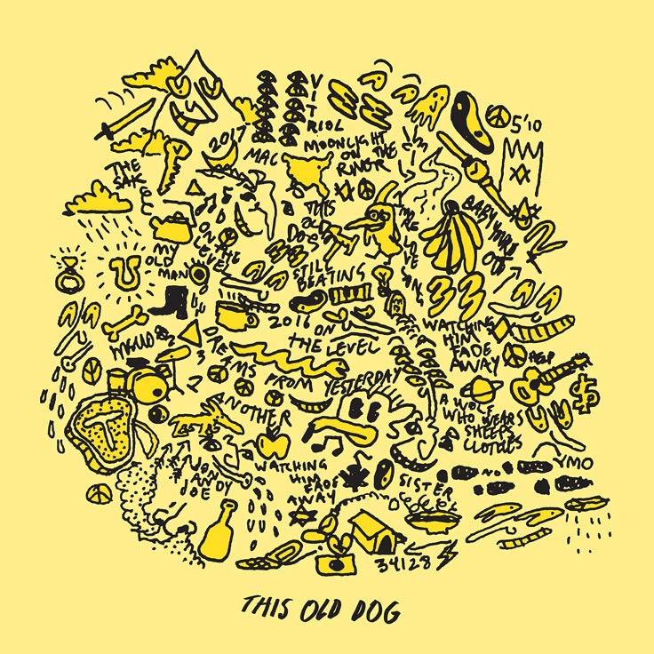 This may contain: this dog is made up of doodles and other things that are drawn by hand