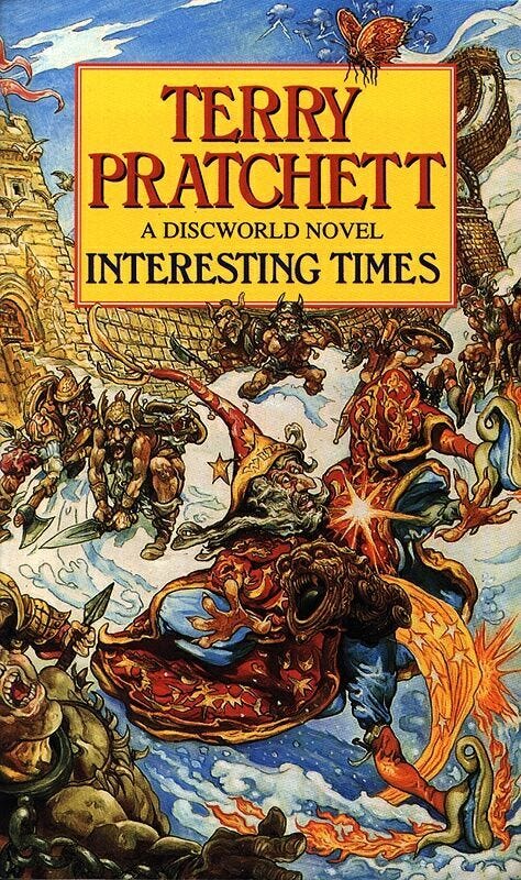 The cover of Terry Pratchett's Interesting Times, and the cover of George MacDonald Fraser's Flashman