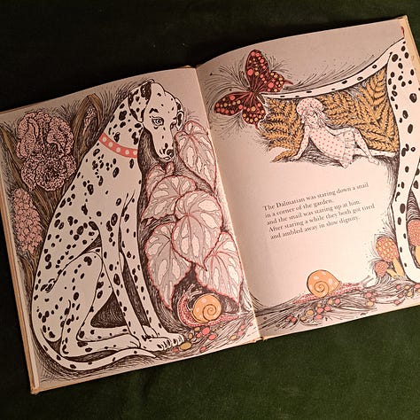 six childhood books set against wood or dark cloth