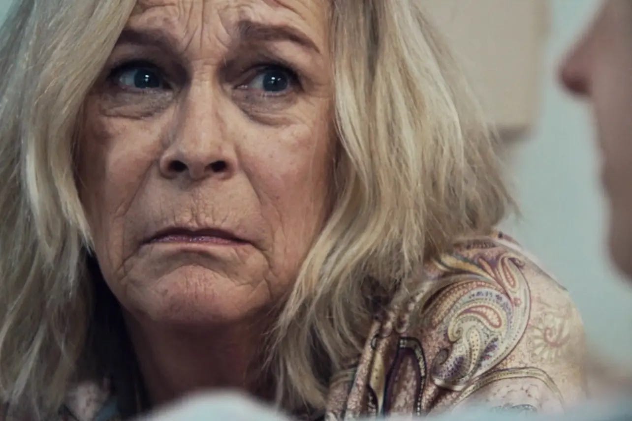 Jamie Lee Curtis stares with concern at her pregnant daughter