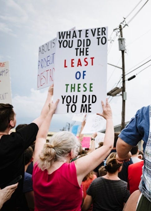 group of protesters with signs