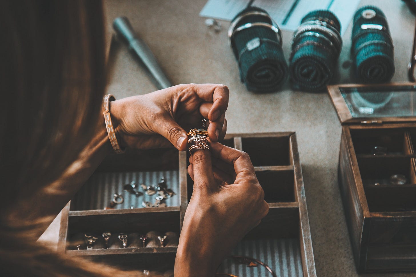 black woman’s hands making jewellery for article by Larry G. Maguire black woman’s hands making jewellery for article by Larry G. Maguire