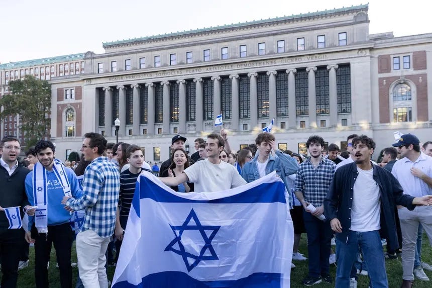 American Zionists waving Israel’s flag, turning public space in America into a stage for foreign war allegiance and political intimidation. American Zionists waving Israel’s flag, turning public space in America into a stage for foreign war allegiance and political intimidation.
