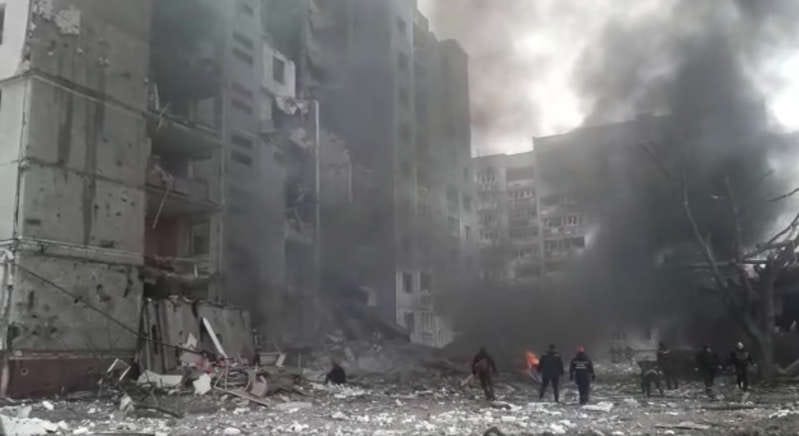 Workers clear the debris after the shelling attack by the Russian army, following Russia's invasion of Ukraine, in Chernihiv, Ukraine, March 3, 2022 in this still image obtained from a social media video. State Emergency Services Of Ukraine/via REUTERS THIS IMAGE HAS BEEN SUPPLIED BY A THIRD PARTY.