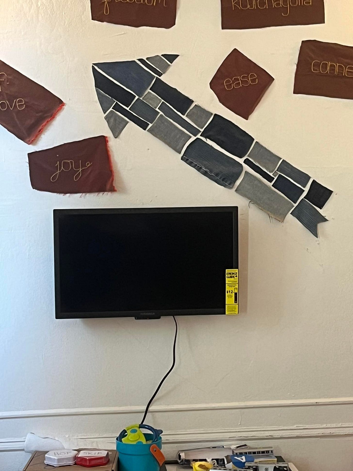 May be an image of light switch and television