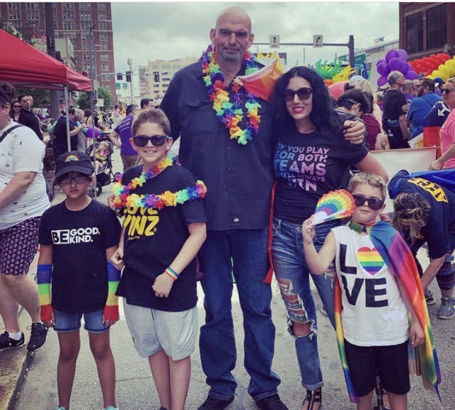 Image of John Fetterman and his family at a Pride parade