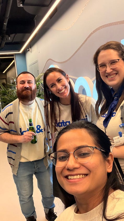 Participants networking, listening to talks, and discussing agents and data engineering during a community night at Google.