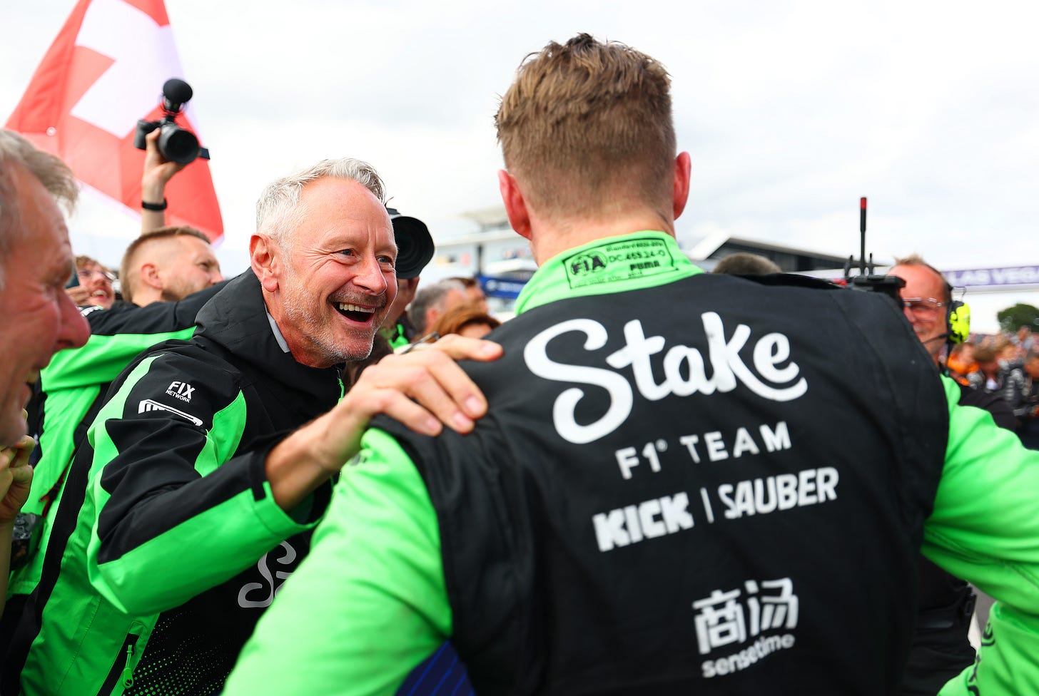 Jonathan Wheatley congratulates Nico Hulkenberg in parc ferme after the British Grand Prix