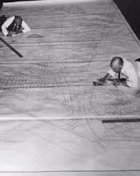 Offices Before Excel and CAD Before computers, architecture was drawn  entirely by hand using pencils, compasses, and large drafting tables.  Offices were filled with drafters, and even minor changes required  redrawing entire