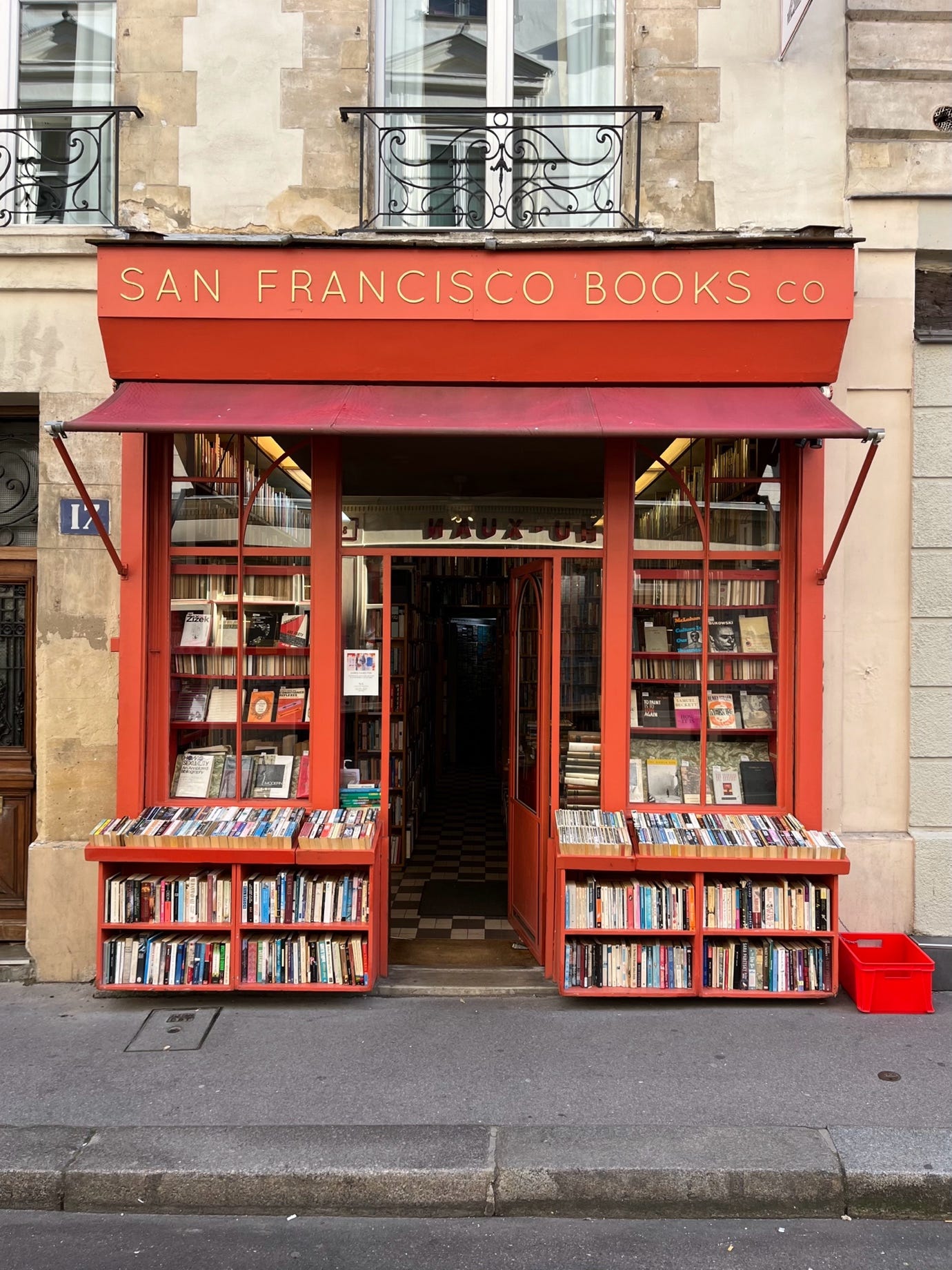 A book store with a red awning

AI-generated content may be incorrect.