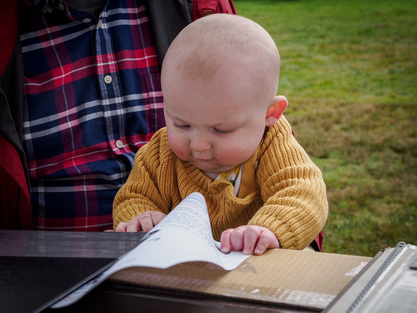 Young child at the Historical Society booth