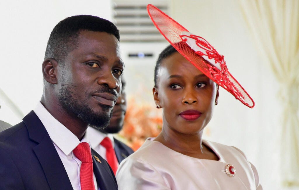 Robert Kyagulanyi, also known as Bobi Wine, of the National Unity Platform (NUP) party, and his wife Barbara Itungo Kyagulanyi, attend a ceremony for his nomination as a presidential candidate at the Electoral Commission offices in Kampala, Uganda,  on 24 September 2025.