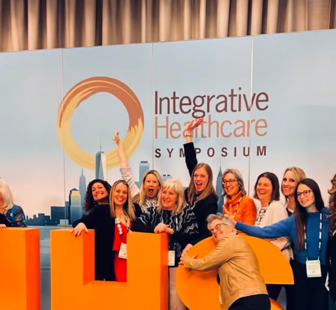 2026 Integrative Healthcare Symposium backdrop with staff and members in NYC. 2026 Integrative Healthcare Symposium backdrop with staff and members in NYC.