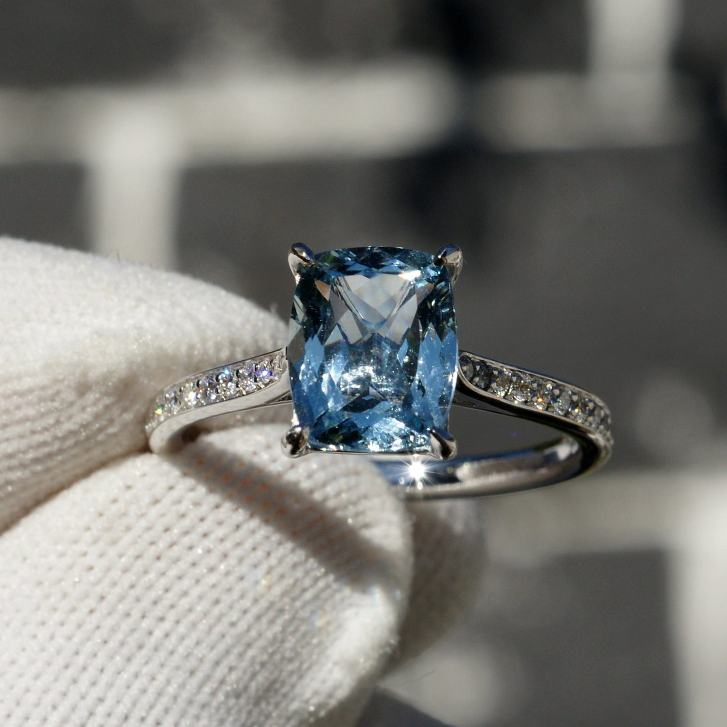https://www.samnsue.com/cdn/shop/files/aquamarine-engagement-ring-diamond-band-the-emily-10x8-1.jpg?v=1751490436&width=2048