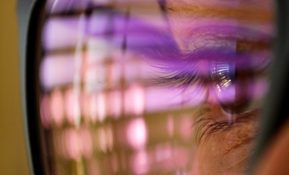 selective focus photography of man wearing eyeglasses