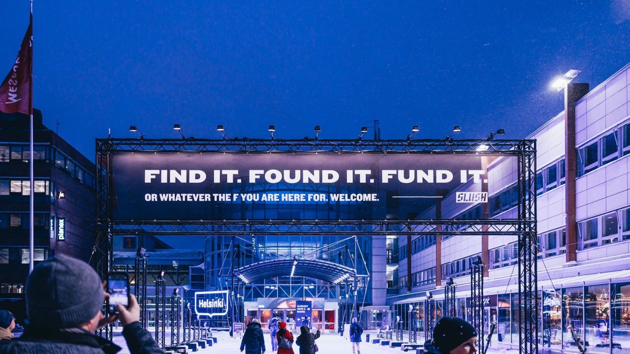 Slush startup conference entrance in Helsinki with illuminated banner reading “Find it. Found it. Fund it.” at night. Slush startup conference entrance in Helsinki with illuminated banner reading “Find it. Found it. Fund it.” at night.