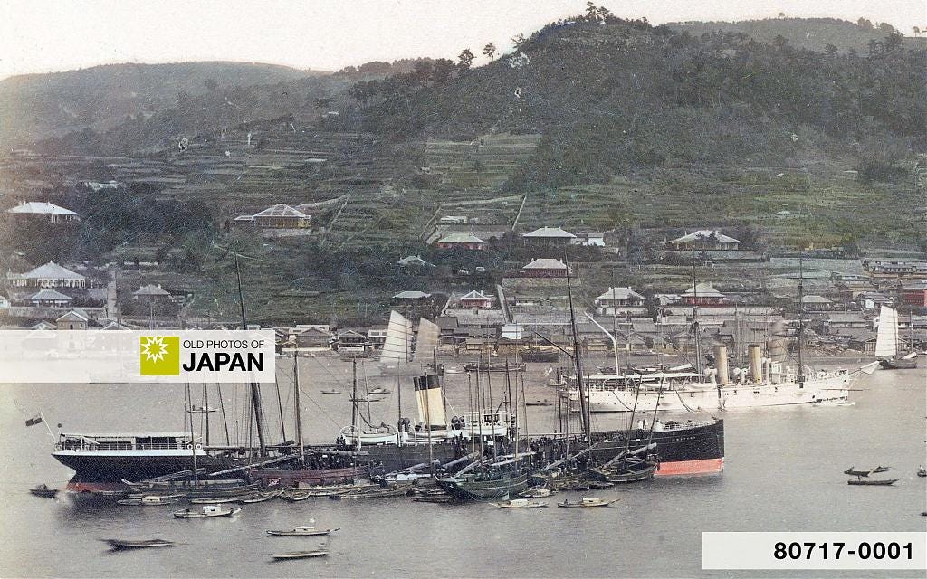 A ship getting coaled in Nagasaki Harbor, ca. 1880s. A ship getting coaled in Nagasaki Harbor, ca. 1880s.