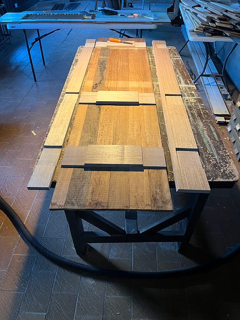 a set of photos showing the rebating, glueing, sanding and painting of a set of wooden doors.