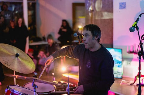 Images of performances in gallery space with artists using various types of sound and projection equipment  