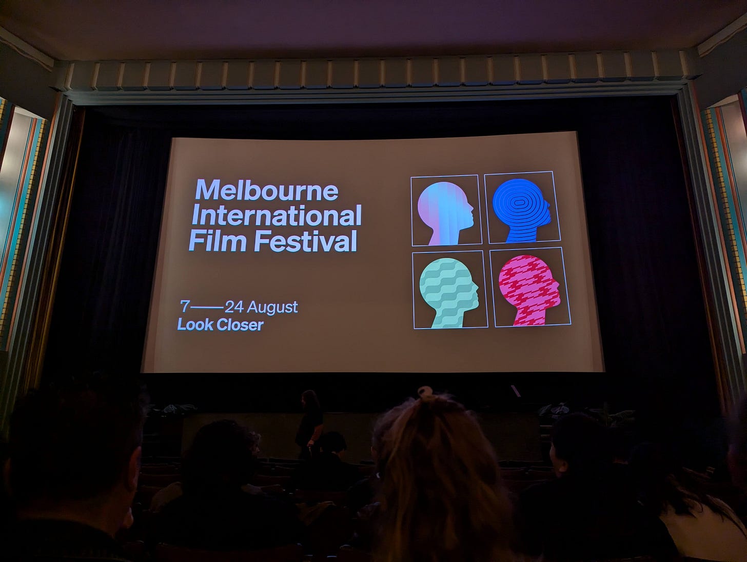 A cinema screen showing the title for the Melbourne International Film Festival