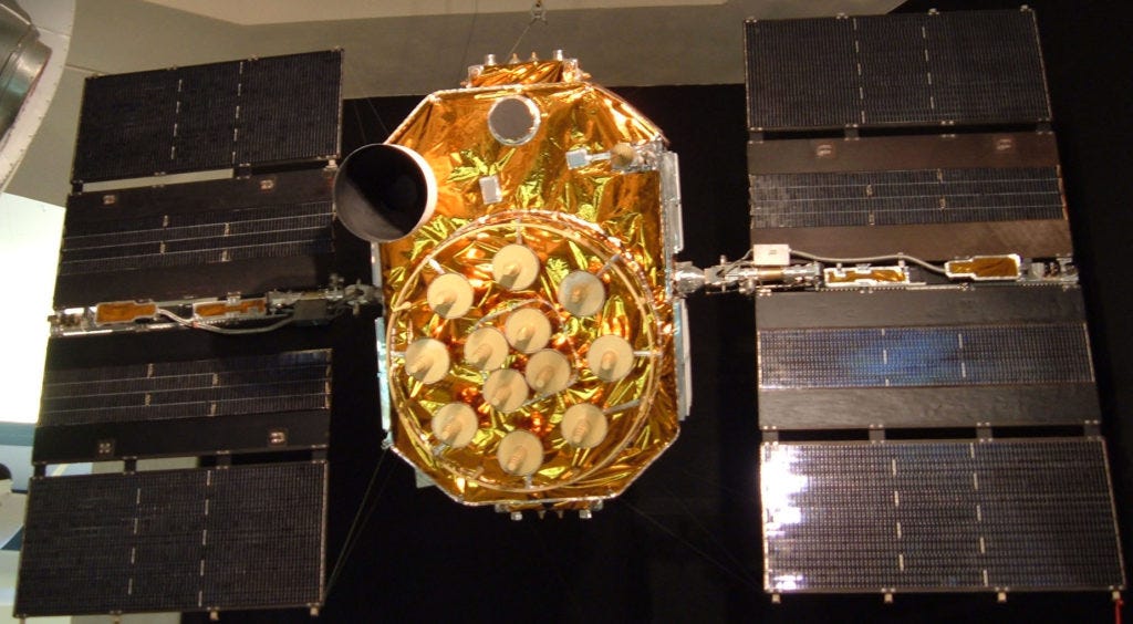 A GPS satellite on display at the San Diego Aerospace Museum. Dozens of these satellites circle overhead. Each orbits Earth at 3.9 kilometers per second. Image Credit: ESA A GPS satellite on display at the San Diego Aerospace Museum. Dozens of these satellites circle overhead. Each orbits Earth at 3.9 kilometers per second. Image Credit: ESA