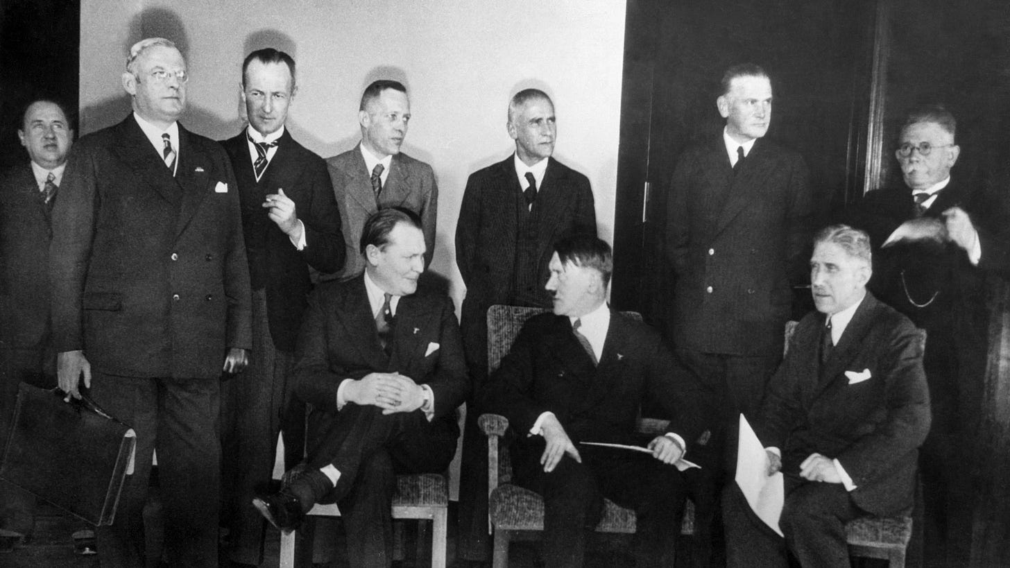 A group of men in suits
AI-generated content may be incorrect. A group of men in suits
AI-generated content may be incorrect.