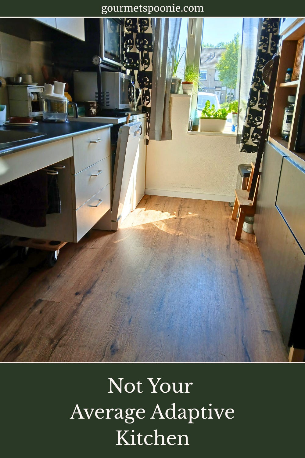 Accessible kitchen in a small flat designed for wheelchair use.