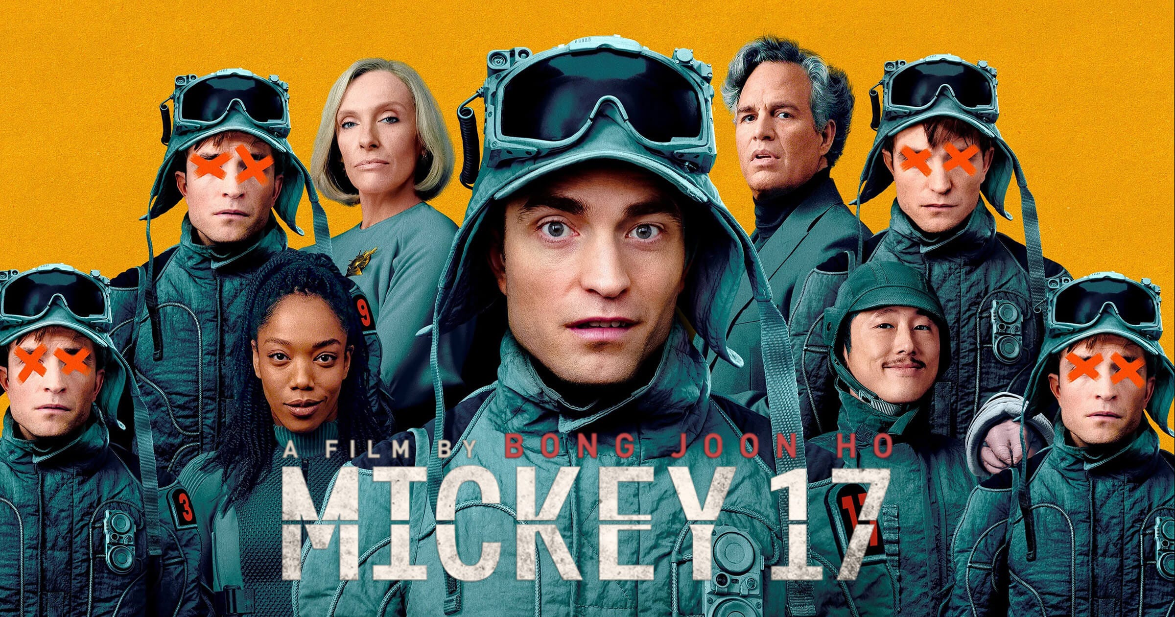 Poster art for Mickey 17 (2025) showing lead Robert Pattinson in a repeated pattern with Xed out eyes. He’s flanked with clones, as well as Toni Collette, Mark Ruffalo, Steven Yeun and Naomi Acki.  Tagline reads: A Film from Bong Joon-ho. Poster art for Mickey 17 (2025) showing lead Robert Pattinson in a repeated pattern with Xed out eyes. He’s flanked with clones, as well as Toni Collette, Mark Ruffalo, Steven Yeun and Naomi Acki.  Tagline reads: A Film from Bong Joon-ho.