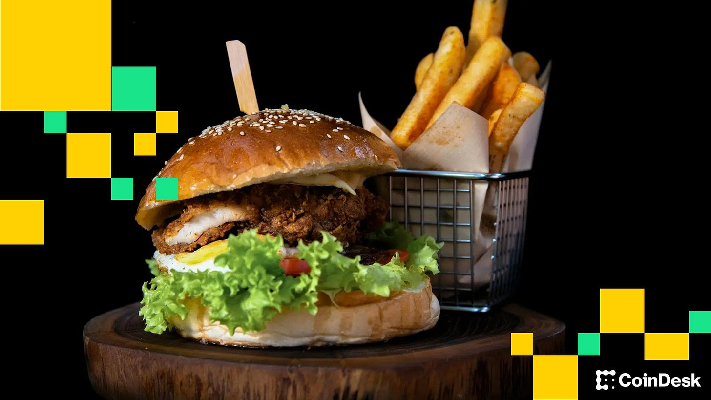 A burger and some fries (sk/Unsplash/Modified by CoinDesk)