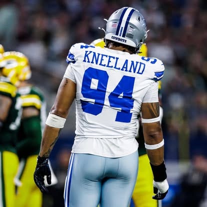 May be an image of 2 people, people playing football and text that says 'CATON CArCh COWBOY8 COWBOYS KNEELAND AND KNEEL 94 94'