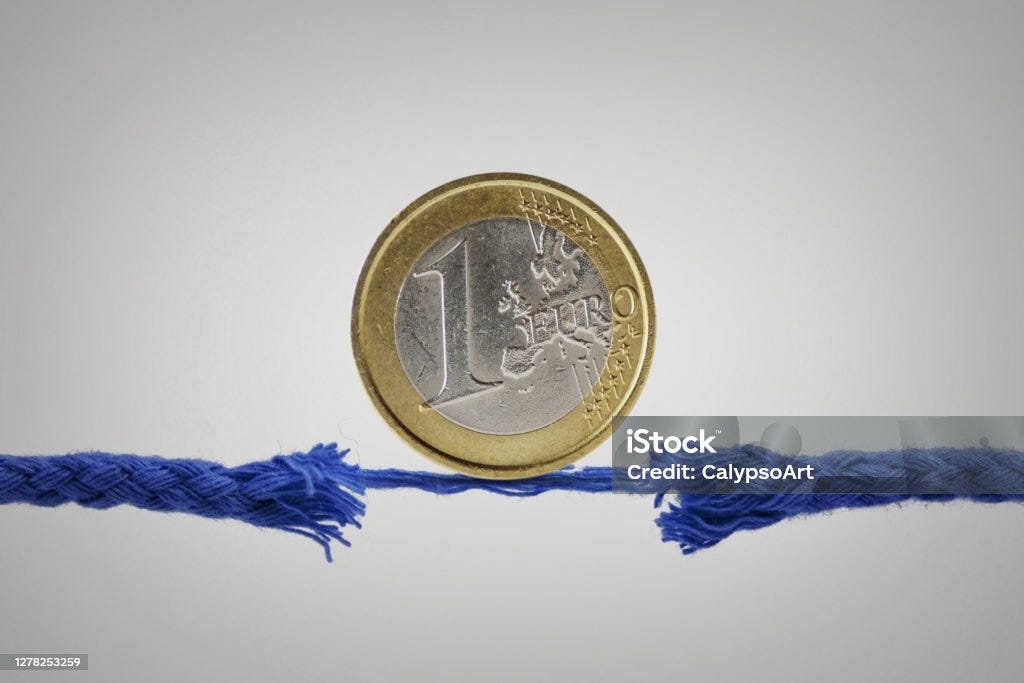 Euro coin on broken rope - Concept of economy and financial risk European Union Currency Stock Photo
