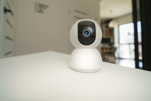 Indoor security camera on a white table
