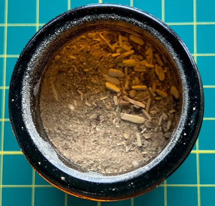 Four jars showing powdered barks