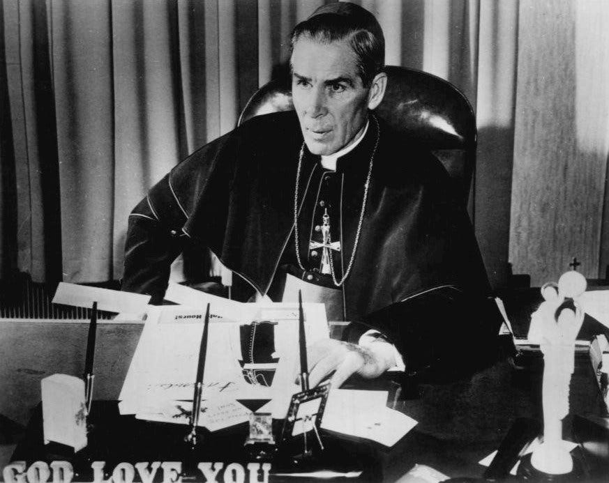 Bishop Fulton J. Sheen at his desk, 1956 Bishop Fulton J. Sheen at his desk, 1956