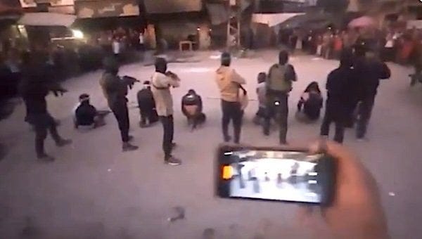 Members of the Islamic terror group Hamas publicly execute their enemies on Monday, Oct. 13, 2025 (Video screenshot)