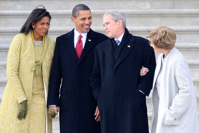 Former President George W. Bush (2-R), his wife Laura (R) stand with President Barack Obama (2-L) and First Lady Michelle Obama (L) as Bush departs from the U.S. Capitol after the inauguration of Barack Obama as the 44th president of the U.S. on Jan. 20, 2009 in Washington, DC.