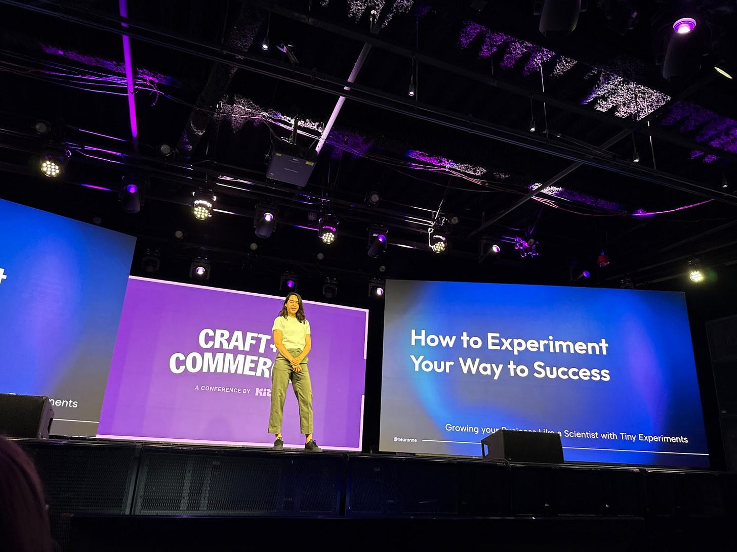 Anne-Laure Le Cunff speaking on stage at a conference with a slide behind her that reads "How to Experiment Your Way to Success" Anne-Laure Le Cunff speaking on stage at a conference with a slide behind her that reads "How to Experiment Your Way to Success"