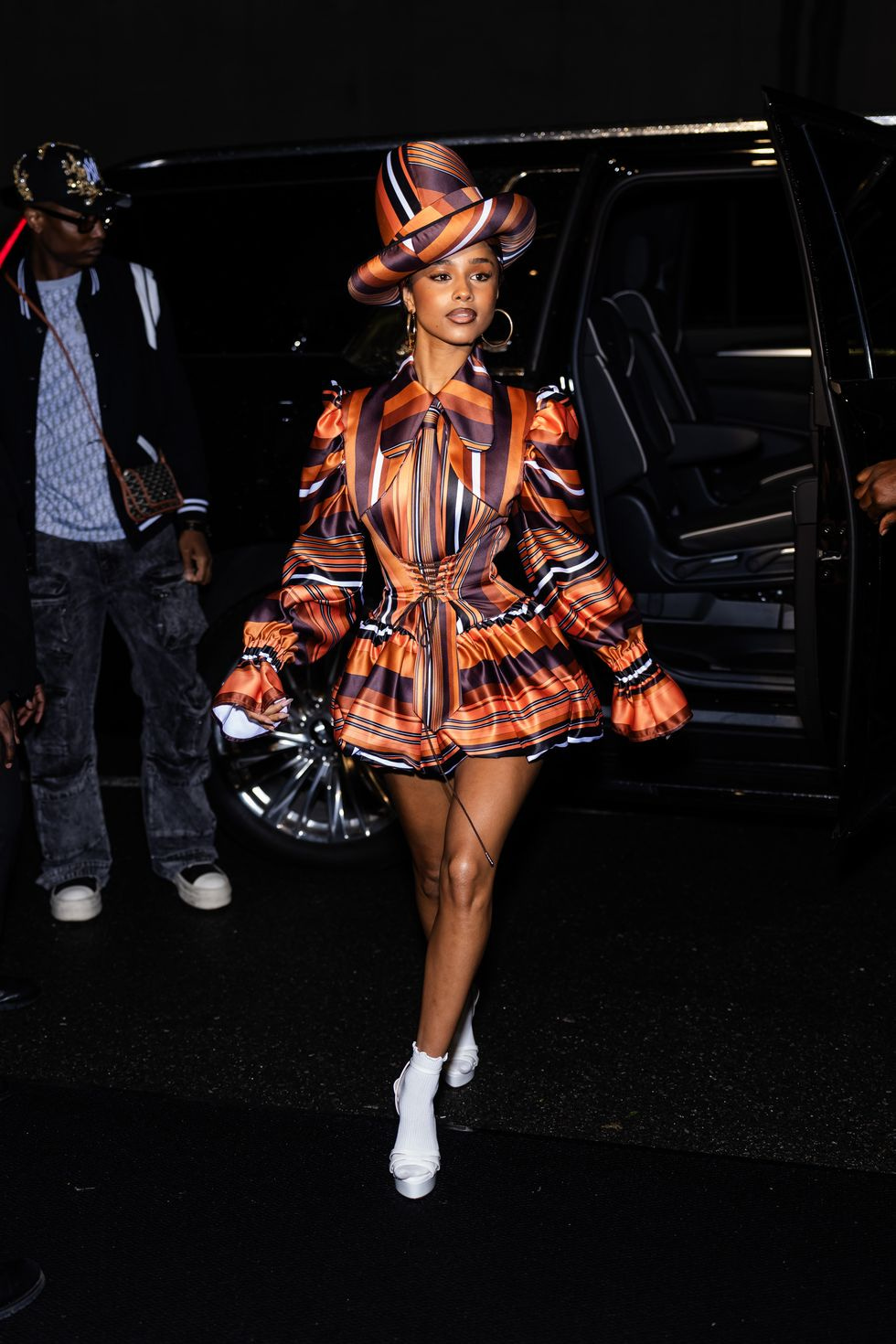 Tyla Stuns in Cinched Minidress and Hat at Pre-Met Gala Event