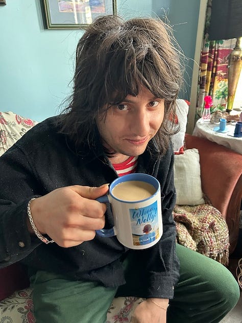Holiday table setting, Cards Against Humanities, young man drinking coffee