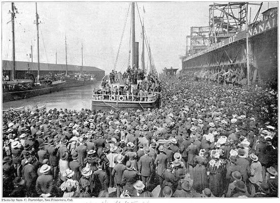 A crush of gold stampeders waiting to board a steamship headed to Skagway, Alaska.