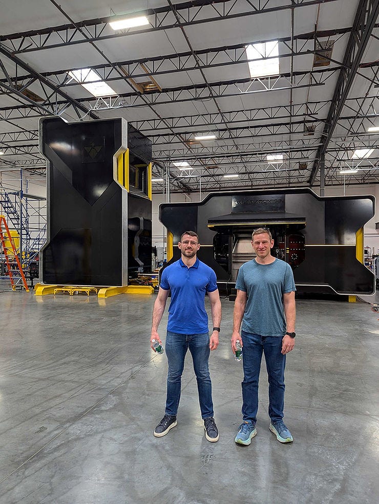 ROS co-founders Stephen and Dan with a small nuclear reactor image ROS co-founders Stephen and Dan with a small nuclear reactor image