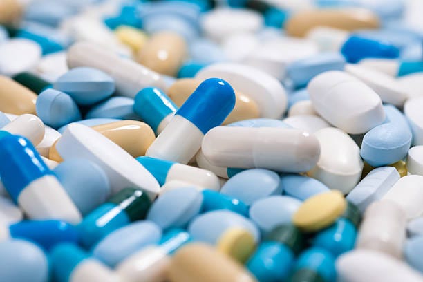 Medicine pills Heap of medicine pills. Close up of colorful tablets and capsules capsules stock pictures, royalty-free photos & images