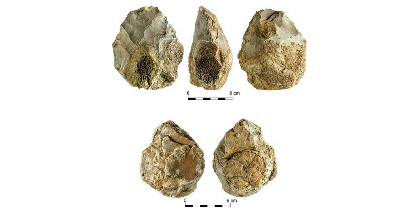 Two handaxes shown in mulitple views, each has a geode visible