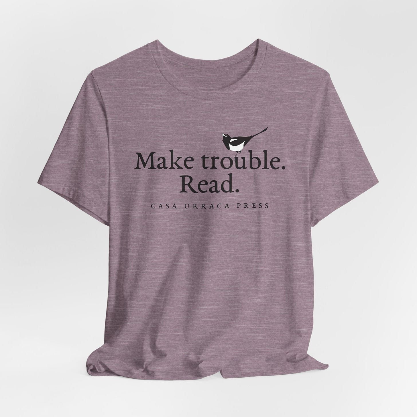 T-shirt that says "Make trouble. Read."