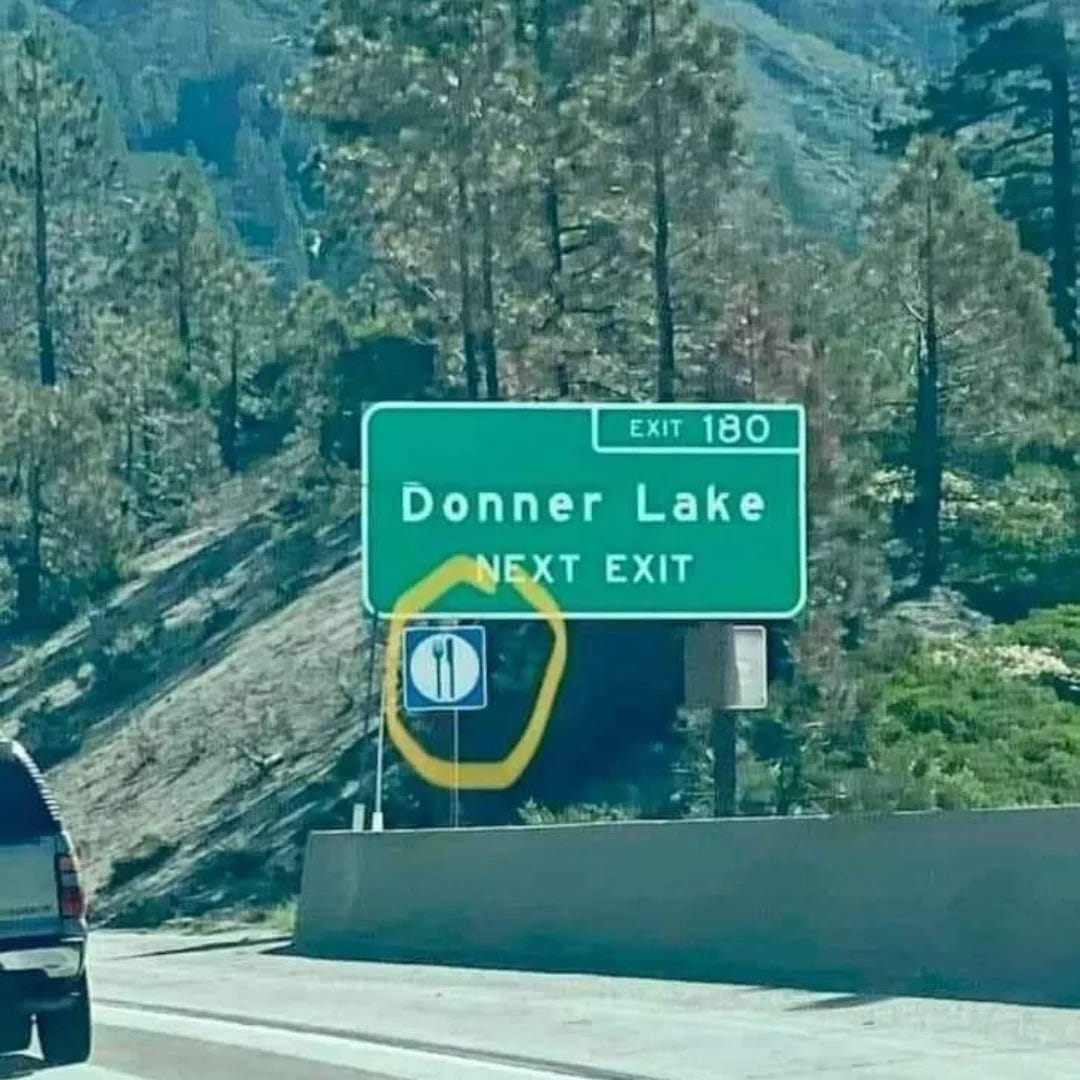 May be an image of signboard, road and text that says 'EXIT EXIT180 180 Lake Donner NEXT EXIT 11'