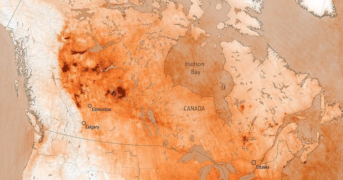 This map of Canada is heavily scored by hazy or intense red-orange lines to highlight sweeping coverage of high carbon monoxide readings across all but the far west. The colour choice gives the impression that most of Canada is scarred by fire, even though these are just gas level readings. This map of Canada is heavily scored by hazy or intense red-orange lines to highlight sweeping coverage of high carbon monoxide readings across all but the far west. The colour choice gives the impression that most of Canada is scarred by fire, even though these are just gas level readings.