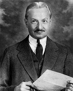 A person in a suit holding a clipboard

AI-generated content may be incorrect.